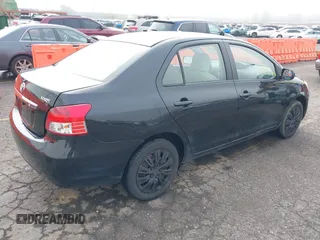 2008 Toyota Yaris with VIN JTDBT903284012329, listed as a IAAI auction lot 41879489 with 117,041 mi miles. Bid and sale history available at carsss.com. Image 4.