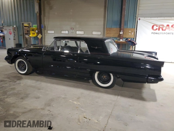 1960 Ford Thunderbird with VIN 0Y71Y188635, listed as a Copart auction lot 49905725 with 1,414 mi miles and Salvage Title. Bid and sale history available at DreamBid. Image 2.