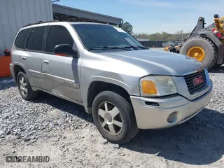 2005 GMC Envoy SLE with VIN 1GKDS13S652390259, listed as a IAAI auction lot 41825258 with 162,172 mi miles. Bid and sale history available at carsss.com. Image 1.