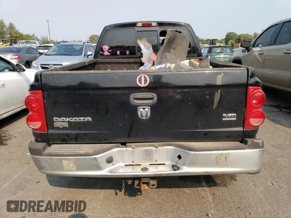 2005 Dodge Dakota Laramie with VIN 1D7HW58N65S161629, listed as a Copart auction lot 66570164 with 205,984 mi miles and Salvage Title. Bid and sale history available at DreamBid. Image 6.