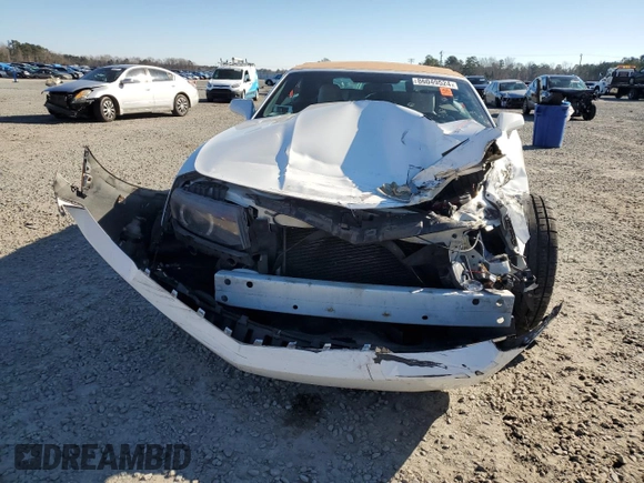 2014 Chevrolet Camaro LT z VIN 2G1FC3D33E9181933, wystawiony jako Copart lot #86049524 z przebiegiem Nie podano mil oraz Szkoda całkowita • Salvage title. Historia ofert i sprzedaży dostępna na DreamBid. Obrazek 5.