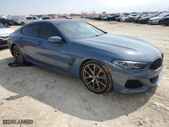 2022 BMW 8 Series M850i with VIN WBAGV8C06NCH98097, listed as a Copart auction lot 43779565 with 18,740 mi miles and Salvage Title. Bid and sale history available at carsss.com. Image 4.