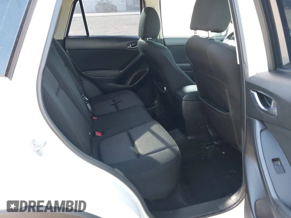 2014 Mazda CX-5 Sport with VIN JM3KE2BE8E0301175, listed as a IAAI auction lot 42051972 with 121,821 mi miles and . Bid and sale history available at carsss.com. Image 8.