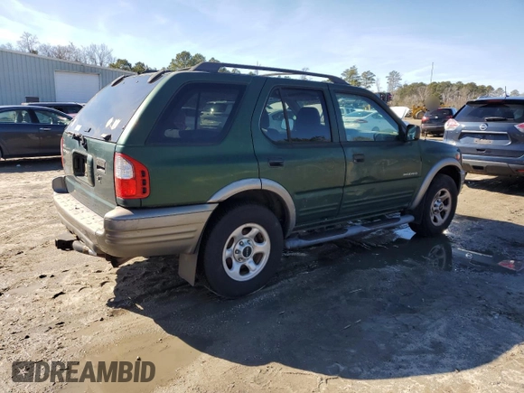 2002 Isuzu Rodeo S z VIN 4S2CK58W724334510, wystawiony jako Copart lot #45355875 z przebiegiem 121 884 mil mil oraz Tytuł czysty. Historia ofert i sprzedaży dostępna na DreamBid. Obrazek 3.