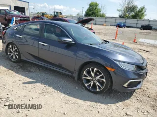 2020 Honda Civic Sedan Touring with VIN 2HGFC1F96LH101008, listed as a Copart auction lot 66308744 with 47,327 mi miles and Non Repairable. Bid and sale history available at carsss.com. Image 4.