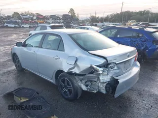 2013 Toyota Corolla L with VIN 5YFBU4EE1DP175281, listed as a IAAI auction lot 41395504 with 180,017 mi miles. Bid and sale history available at carsss.com. Image 3.