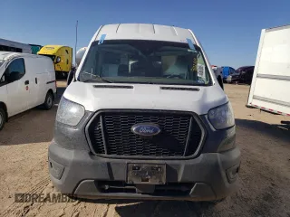 2023 Ford Transit Cargo z VIN 1FTBR1X81PKA66166, wystawiony jako Copart lot #46865065 z przebiegiem 108 487 mil mil oraz Szkoda całkowita • Salvage title. Historia ofert i sprzedaży dostępna na DreamBid. Obrazek 5.