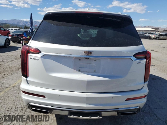 2020 Cadillac XT6 FWD Premium Luxury with VIN 1GYKPCRS8LZ177562, listed as a Copart auction lot 57123195 with Not provided miles and Salvage title. Bid and sale history available at DreamBid. Image 6.