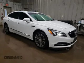 2017 Buick LaCrosse Essence with VIN 1G4ZP5SS1HU113499, listed as a Copart auction lot 52133555 with 154,794 mi miles and Salvage Title. Bid and sale history available at DreamBid. Image 4.