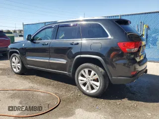 2012 Jeep Grand Cherokee Laredo with VIN 1C4RJFAT8CC307774, listed as a Copart auction lot 48368725 with 84,549 mi miles and Salvage Title. Bid and sale history available at carsss.com. Image 2.