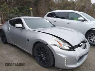 2016 Nissan 370Z with VIN JN1AZ4EH9GM932543, listed as a IAAI auction lot 41515950 with 103,188 mi miles. Bid and sale history available at carsss.com. Image 1.