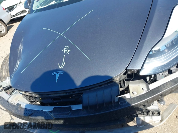 2022 Tesla Model 3 with VIN 5YJ3E1EAXNF326354, listed as a IAAI auction lot 41651872 with 27,922 mi miles and . Bid and sale history available at DreamBid. Image 13.