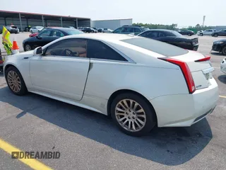 2012 Cadillac CTS Premium z VIN 1G6DP1E3XC0108543, wystawiony jako IAAI lot #42413547 z przebiegiem 80 570 mil mil oraz . Historia ofert i sprzedaży dostępna na DreamBid. Obrazek 3.