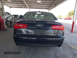 2014 Audi A6 Premium Plus with VIN WAUGFAFC1EN005090, listed as a IAAI auction lot 42137480 with 85,920 mi miles and . Bid and sale history available at DreamBid. Image 17.