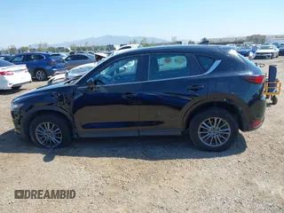 2020 Mazda CX-5 Sport with VIN JM3KFABM2L0761184, listed as a IAAI auction lot 41847768 with 47,582 mi miles. Bid and sale history available at carsss.com. Image 14.