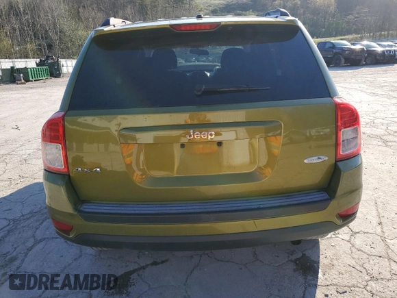 2012 Jeep Compass Latitude with VIN 1C4NJDEB6CD630669, listed as a Copart auction lot 52028235 with 124,123 mi miles and Salvage Title. Bid and sale history available at DreamBid. Image 6.
