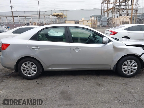 2013 Kia Forte LX with VIN KNAFT4A21D5739585, listed as a IAAI auction lot 42097213 with 195,500 mi miles. Bid and sale history available at carsss.com. Image 14.