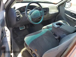 2001 Ford F-150 XL with VIN 1FTRX17W11NA24623, listed as a Copart auction lot 56767345 with 201,959 mi miles and Salvage title. Bid and sale history available at DreamBid. Image 8.