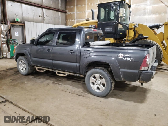 2009 Toyota Tacoma z VIN 3TMLU42N79M027000, wystawiony jako Copart lot #58371365 z przebiegiem 168 989 mil mil oraz Szkoda całkowita • Salvage title. Historia ofert i sprzedaży dostępna na DreamBid. Obrazek 2.