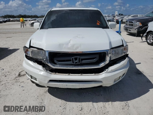 2010 Honda Ridgeline RTL with VIN 5FPYK1F51AB011041, listed as a Copart auction lot 77210844 with 81,265 mi miles and Salvage Title. Bid and sale history available at carsss.com. Image 5.