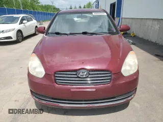 2006 Hyundai Accent GL z VIN KMHCN45C26U052459, wystawiony jako Copart lot #60089355 z przebiegiem 247 311 mil mil oraz Szkoda całkowita • Salvage title. Historia ofert i sprzedaży dostępna na DreamBid. Obrazek 5.
