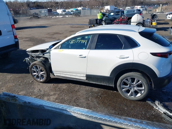 2022 Mazda CX-30 S Select z VIN 3MVDMBBL8NM448787, wystawiony jako IAAI lot #41577914 z przebiegiem 64 552 mil mil oraz . Historia ofert i sprzedaży dostępna na DreamBid. Obrazek 15.