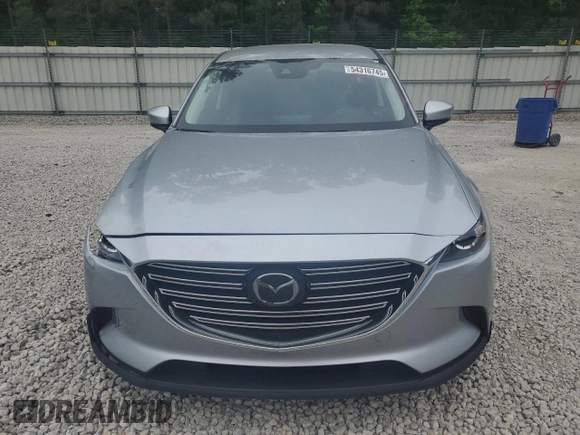 2022 Mazda CX-9 Touring with VIN JM3TCBCY6N0607357, listed as a Copart auction lot 54316745 with 66,888 mi miles and Salvage title. Bid and sale history available at DreamBid. Image 5.