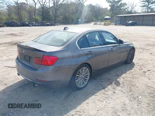 2013 BMW 3 Series 335i with VIN WBA3A9C51DF476537, listed as a IAAI auction lot 41900742 with 184,094 mi miles and . Bid and sale history available at DreamBid. Image 4.
