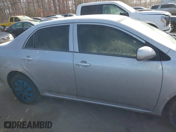 2010 Toyota Corolla with VIN 1NXBU4EE5AZ217378, listed as a IAAI auction lot 41402973 with 130,303 mi miles. Bid and sale history available at carsss.com. Image 13.