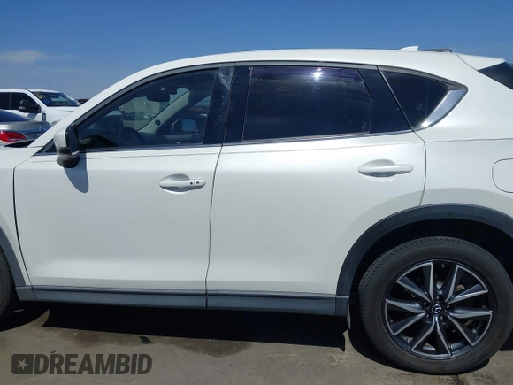 2018 Mazda CX-5 Grand Touring с VIN JM3KFADM7J0373815, выставлен на аукционе IAAI как лот 42500311 с пробегом 106 354 миль миль и . История ставок и продаж доступна на DreamBid. Изображение 14.