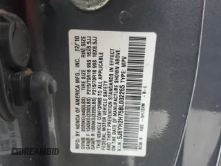 2011 Honda Element EX z VIN 5J6YH2H75BL002265, wystawiony jako Copart lot #56382765 z przebiegiem Nie podano mil oraz Szkoda całkowita • Salvage title. Historia ofert i sprzedaży dostępna na DreamBid. Obrazek 13.