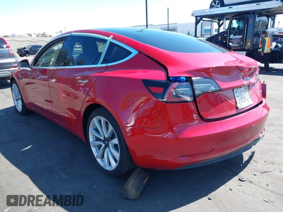 2018 Tesla Model 3 Long Range Battery with VIN 5YJ3E1EB5JF146184, listed as a IAAI auction lot 41808346 with 97,496 mi miles and . Bid and sale history available at DreamBid. Image 3.