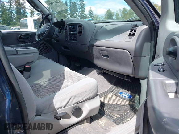 2003 Ford F-150 XLT with VIN 1FTRW08L93KD64270, listed as a IAAI auction lot 42088905 with 181,528 mi miles. Bid and sale history available at carsss.com. Image 5.