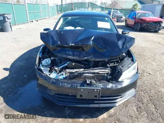 2016 Volkswagen Jetta Sedan 1.4T SE w/Connectivity with VIN 3VWD67AJ1GM369678, listed as a IAAI auction lot 41828693 with 110,964 mi miles. Bid and sale history available at carsss.com. Image 6.