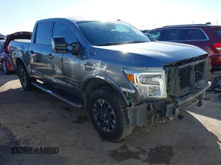 2017 Nissan Titan SL z VIN 1N6AA1E52HN555152, wystawiony jako IAAI lot #41504819 z przebiegiem 89 656 mil mil oraz . Historia ofert i sprzedaży dostępna na DreamBid. Obrazek 1.