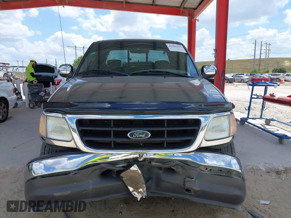 2002 Ford F-150 XL with VIN 2FTRX07L82CA55701, listed as a IAAI auction lot 41966222 with 103,226 mi miles and . Bid and sale history available at DreamBid. Image 12.