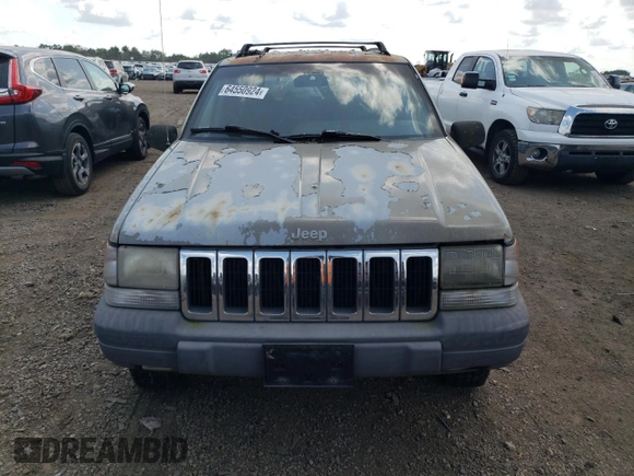 1997 Jeep Grand Cherokee Laredo z VIN 1J4GZ58S4VC502596, wystawiony jako Copart lot #88255865 z przebiegiem Nie podano mil oraz Nie do naprawy • Non repairable. Historia ofert i sprzedaży dostępna na DreamBid. Obrazek 5.
