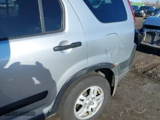 2002 Honda CR-V EX with VIN JHLRD78812C089581, listed as a IAAI auction lot 41098313 with 135,160 mi miles. Bid and sale history available at carsss.com. Image 6.