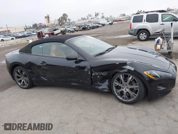 2014 Maserati GranTurismo Sport with VIN ZAM45MMA4E0078412, listed as a IAAI auction lot 42239631 with 31,392 mi miles and . Bid and sale history available at DreamBid. Image 12.
