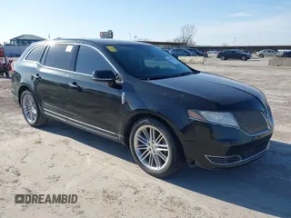 2014 Lincoln MKT EcoBoost with VIN 2LMHJ5AT3EBL56146, listed as a IAAI auction lot 41592528 with 141,688 mi miles and . Bid and sale history available at DreamBid. Image 1.