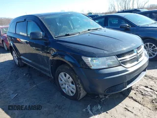 2013 Dodge Journey SE with VIN 3C4PDCAB7DT731506, listed as a IAAI auction lot 41762394 with 215,424 mi miles. Bid and sale history available at carsss.com. Image 1.