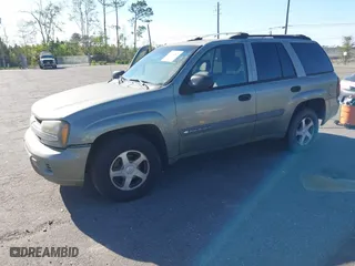 2004 Chevrolet TrailBlazer LS with VIN 1GNDT13S942209802, listed as a IAAI auction lot 41842521 with 197,319 mi miles. Bid and sale history available at carsss.com. Image 2.