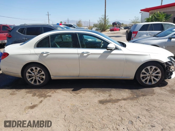2019 Mercedes-Benz E-Class E 300 with VIN WDDZF4JBXKA597397, listed as a IAAI auction lot 41724672 with 99,258 mi miles. Bid and sale history available at carsss.com. Image 13.