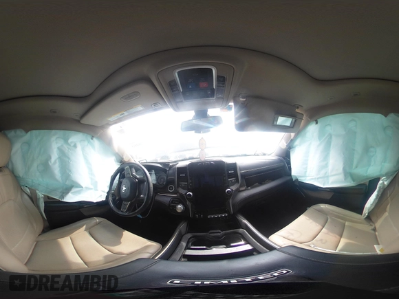 2020 Ram 1500 Limited with VIN 1C6SRFHT5LN422246, listed as a IAAI auction lot 41948083 with 82,032 mi miles and . Bid and sale history available at DreamBid. Image 18.