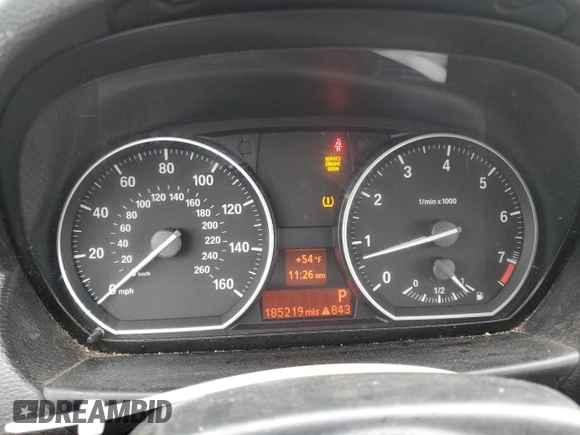 2009 BMW 1 Series 128i with VIN WBAUL73509VJ75919, listed as a Copart auction lot 83335344 with 185,219 mi miles and Salvage Title. Bid and sale history available at DreamBid. Image 9.