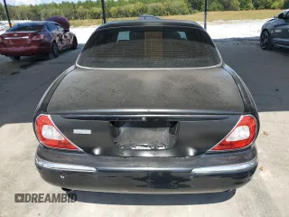 2004 Jaguar XJ с VIN SAJEA73B24TG10774, выставлен на аукционе Copart как лот 72577604 с пробегом 217 846 миль миль и Чистый • Clean title. История ставок и продаж доступна на DreamBid. Изображение 6.