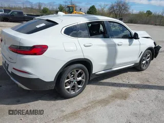 2021 BMW X4 xDrive30i with VIN 5UX2V1C03M9F12611, listed as a IAAI auction lot 42145740 with 60,417 mi miles and . Bid and sale history available at DreamBid. Image 4.