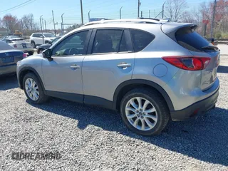 2014 Mazda CX-5 Grand Touring with VIN JM3KE4DY3E0368169, listed as a IAAI auction lot 41857976 with 127,853 mi miles. Bid and sale history available at carsss.com. Image 3.