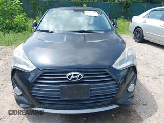 2013 Hyundai Veloster Turbo с VIN KMHTC6AE2DU111256, выставлен на аукционе IAAI как лот 42796383 с пробегом 127 660 миль миль и . История ставок и продаж доступна на DreamBid. Изображение 6.