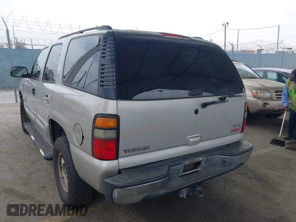 2005 GMC Yukon SLT z VIN 1GKEC13V65J250116, wystawiony jako IAAI lot #42497157 z przebiegiem 196 813 mil mil oraz . Historia ofert i sprzedaży dostępna na DreamBid. Obrazek 3.
